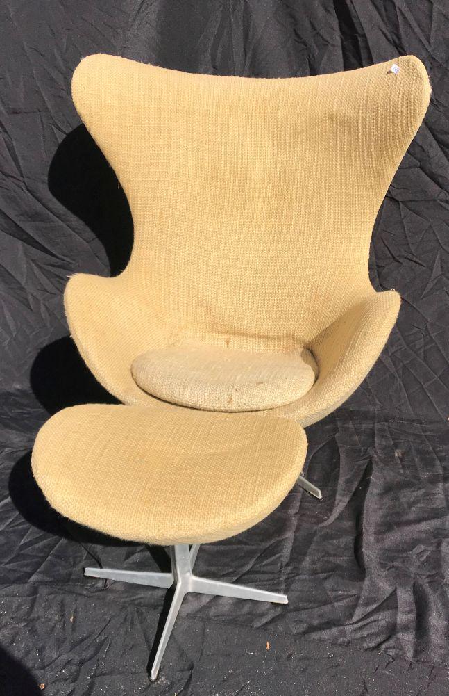 ARNE JACOBSEN EGG CHAIR WITH OTTOMAN. VINTAGE IN: ARNE JACOBSEN EGG CHAIR WITH OTTOMAN. VINTAGE IN ORIGINAL FABRIC. Don't like the color? Check out the vintage bolts of fabric also in this sale. CHAIR: 42" H X 33.8" W X 31.1" D, 14.5" H seat, OTTOMAN