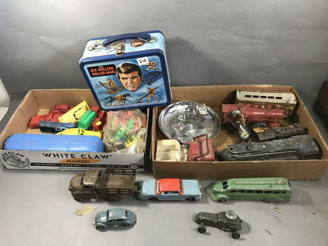 ANTIQUE TOY LOT INCLUDES 6 MILLION DOLLAR MAN LUNCHBOX,: ANTIQUE TOY LOT INCLUDES 6 MILLION DOLLAR MAN LUNCHBOX, VINTAGE TRAINS AND CARS. THE LINCOLN ESTATE OF TURNERS FALLS