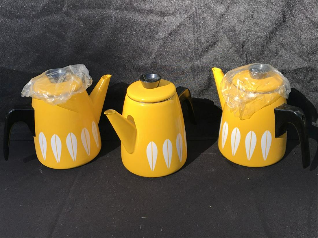 3 NEW OLD STOCK CATHRINE HOLM ENAMELLED YELLOW COFFEE: 3 NEW OLD STOCK CATHRINE HOLM ENAMELLED YELLOW COFFEE POTS. PROPERTY FROM THE ESTATE OF THE LEIF WESSMANN