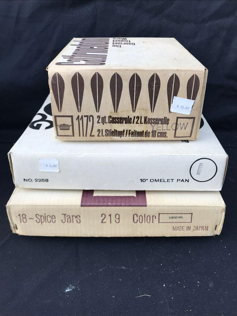 CATHRINE HOLM NEW OLD STOCK; UNOPENED YELLOW 2 QUART: CATHRINE HOLM NEW OLD STOCK; UNOPENED YELLOW 2 QUART CASSEROLE, UNOPENED YELLOW 10" OMELET PAN, 16 TANGERINE SPICE JARS, ONLY LIDS NO SHAKER TOPS. PROPERTY FROM THE ESTATE OF LEIF WESSMANN.
