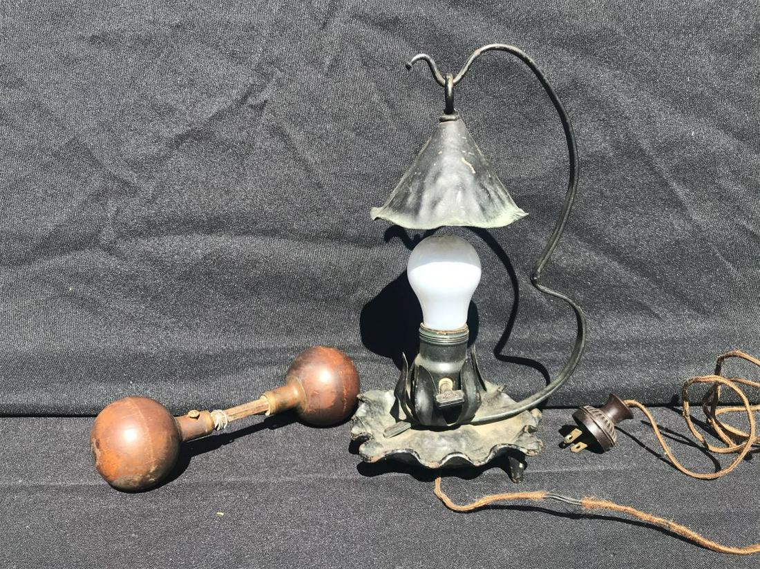 AN ARTS AND CRAFTS GUSTAV STICKLEY HAMMERED TABLE LAMP: AN ARTS AND CRAFTS GUSTAV STICKLEY HAMMERED TABLE LAMP AND A PAIR OF ROUND WOOD DOORKNOBS 11" AND 8". PROPERTY FROM A PRIVATE NORTHAMPTON COLLECTION