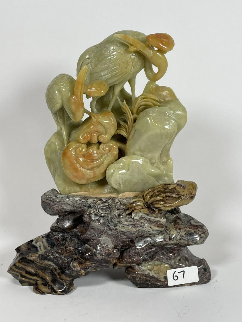 A LARGE CHINESE CARVED HARDSTONE SCULPTURE OF BIRDS ON: A LARGE CHINESE CARVED HARDSTONE SCULPTURE OF BIRDS ON A PEDESTAL 10.5" X 9" X 4". WEIGHS 9 LBS