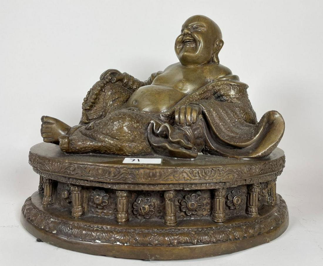 AN ANTIQUE CHINESE BRONZE RECLINING BUDDHA ON PEDESTAL: AN ANTIQUE CHINESE BRONZE RECLINING BUDDHA ON PEDESTAL 12" X 8" X 8.5". WEIGHS 18 LBS 8 OZ
