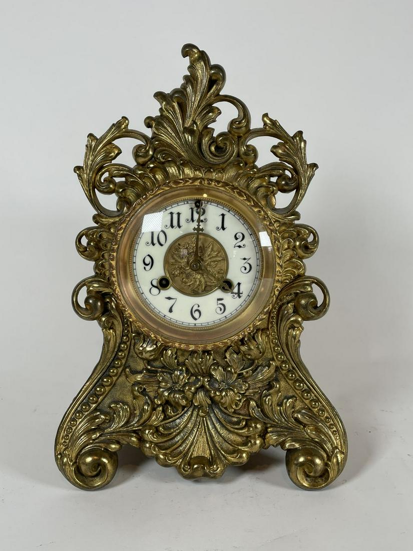 A 13" T DORE BRONZE ART NOUVEAU MANTLE CLOCK WITH: A 13" T DORE BRONZE ART NOUVEAU MANTLE CLOCK WITH ENAMELED DIAL. WEIGHS 9 LBS