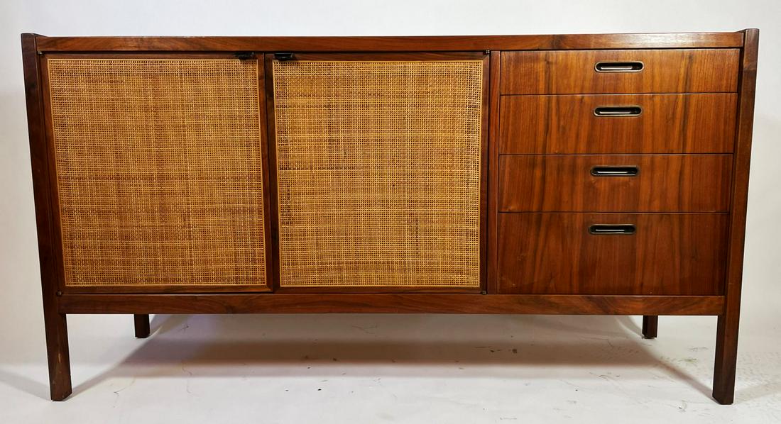A JACK CARTWRIGHT MIDCENTURY MODERN WALNUT SIDEBOARD: A JACK CARTWRIGHT MIDCENTURY MODERN WALNUT SIDEBOARD WITH RATTAN DOORS AND LEATHER PULLS 61" X 32" X 18.5". EXCELLENT OVERALL CONDITION