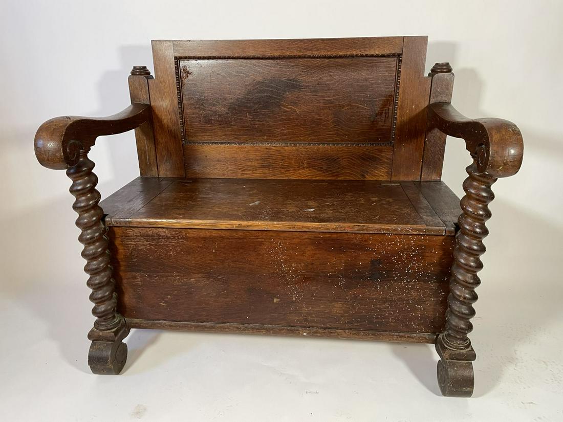 A VICTORIAN OAK HALL BENCH WITH PRETZEL TWIST ARMS: A VICTORIAN OAK HALL BENCH WITH PRETZEL TWIST ARMS
