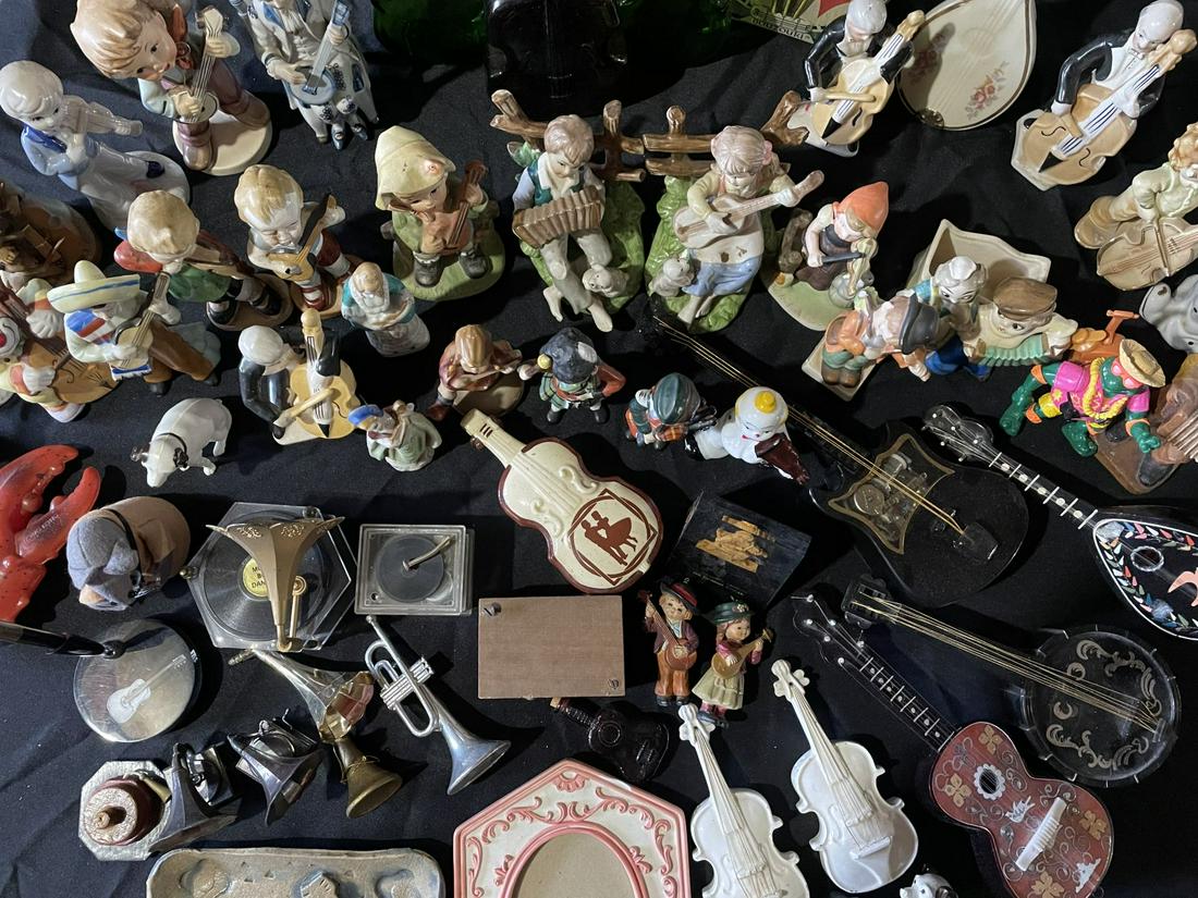 THREE TRAYS OF MUSIC RELATED FIGURINES AND MUSIC BOXES: THREE TRAYS OF MUSIC RELATED FIGURINES AND MUSIC BOXES