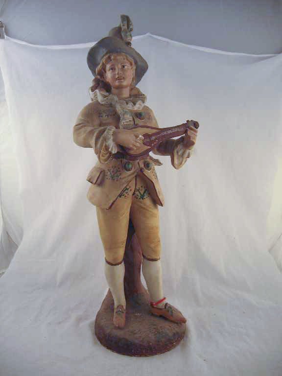 LARGE CHALKWARE VICTORIAN FIGURE OF A MAN PLAYI