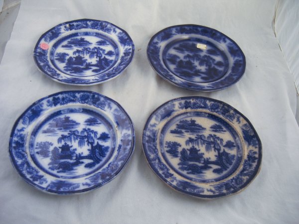 4 19TH CENTURY FLOW BLUE PLATES MARKED "PEARL S: 4 19TH CENTURY FLOW BLUE PLATES MARKED "PEARL STONEWARE- P.W. & CO." MANILA IRONSTONE. 8.5" DIAMETER