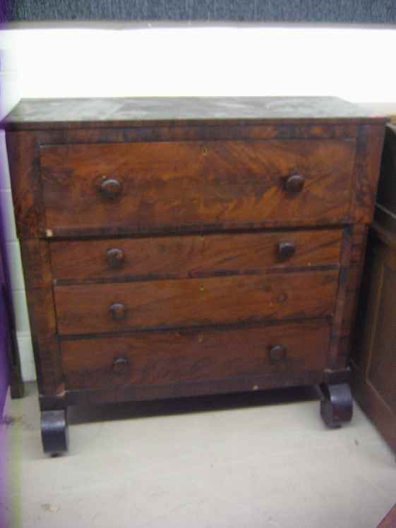 EMPIRE CROTCH MAHOGANY 4 DRAWER CHEST WITH ROLL