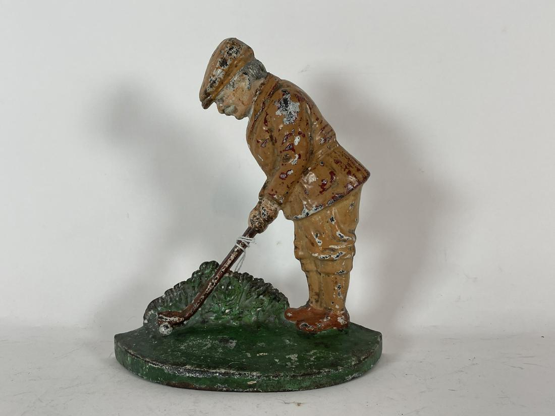 AN ANTIQUE CAST IRON GOLF DOOR STOP 8.5" TALL X 7" WIDE (1 of 2)