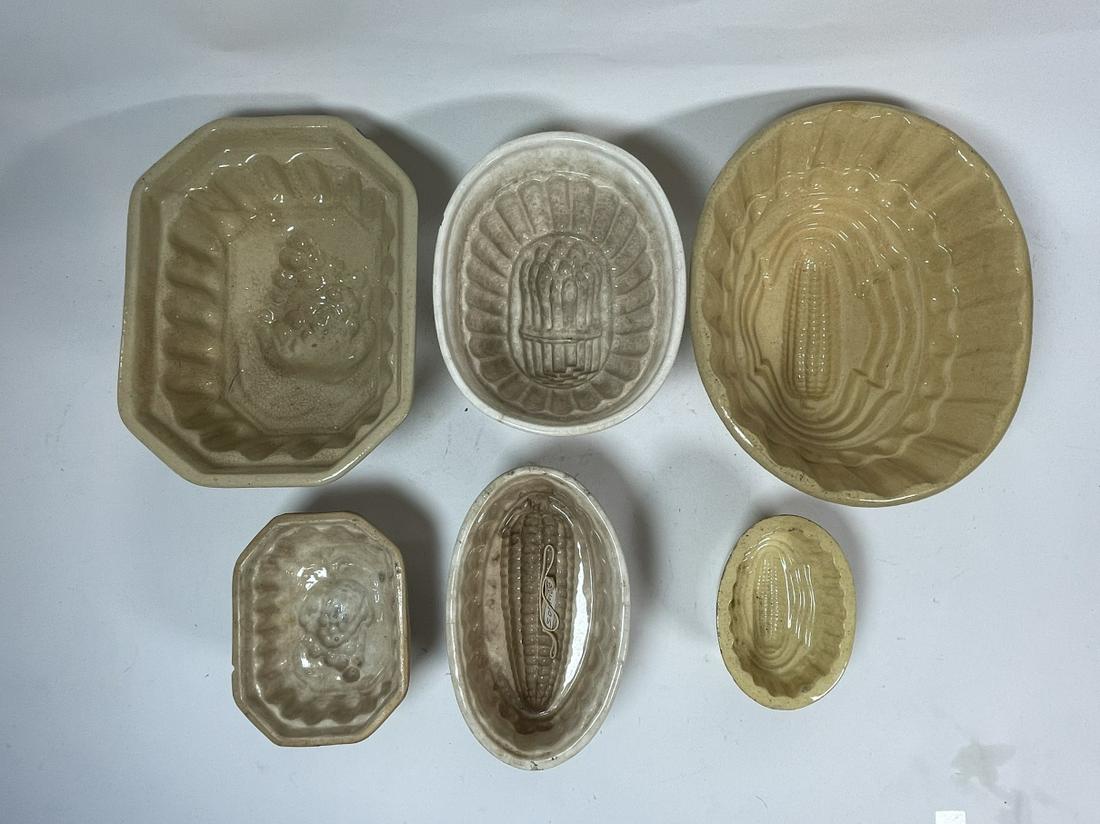 A COLLECTION OF YELLOWARE SUGAR MOLDS: A COLLECTION OF YELLOWARE SUGAR MOLDS