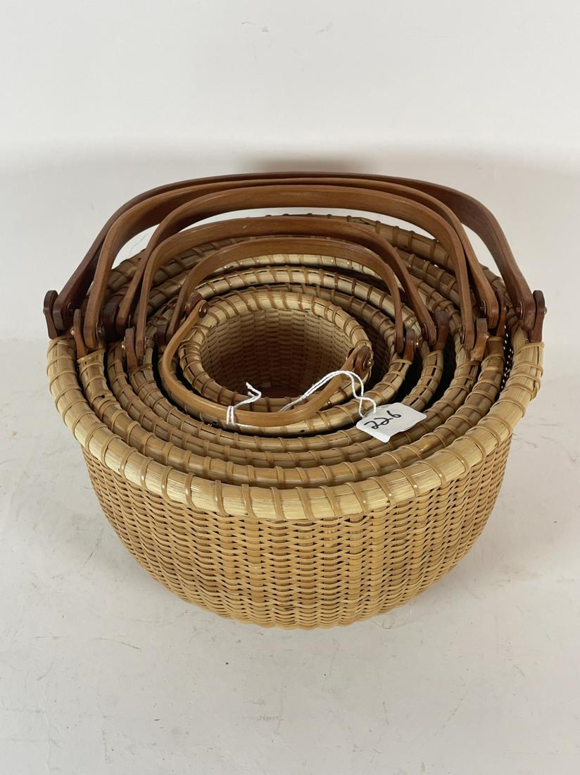 A NESTING SET OF 6 NANTUCKET BASKETS, 8.5" IN (1 of 5)