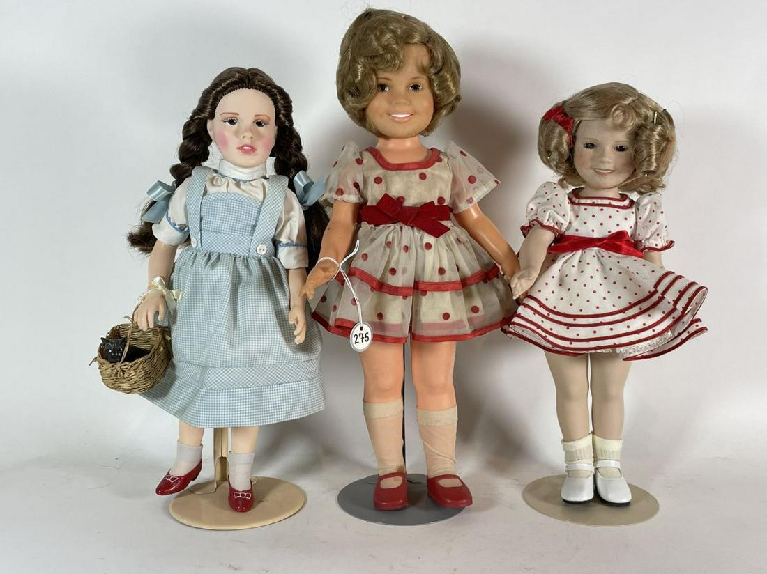 A 19.5" SHIRLEY TEMPLE IDEAL PLASTIC DOLL , A 1966 14": A 19.5" SHIRLEY TEMPLE IDEAL PLASTIC DOLL , A 1966 14" EFFANBEE DOROTHY DOLL AND A 13" PORCELAIN SHIRLEY TEMPLE DOLL