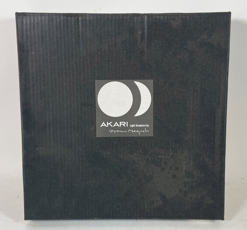 AKARI LIGHT SCULPTURE BY ISAMU NOGUCHI 14" X 10": AKARI LIGHT SCULPTURE BY ISAMU NOGUCHI 14" X 10". LANTERN SHADE HAS DISCOLORATION TO PAPER WHICH INDICATES AGE. IT APPEARS TO BE ABOUT 30 YEARS OLD NOR SEEMS TO HAVE BEEN ASSEMBLED.