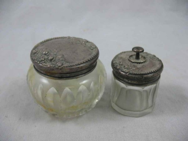 PAIR OF CRYSTAL PASTE JARS WITH STERLING REPOU: PAIR OF CRYSTAL PASTE JARS WITH STERLING REPOUSSE LIDS 2" & 1.5"D
