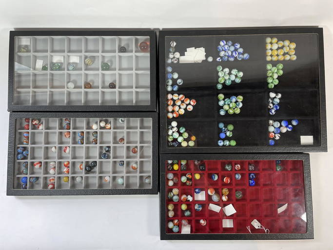 Four Display Cases Of Antique Marbles