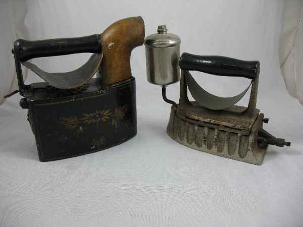 2 19TH CENTURY SAD IRONS, 1 WITH STENCILING: 2 19TH CENTURY SAD IRONS, 1 WITH STENCILING