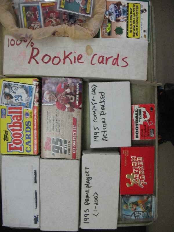 LARGE LOT OF FOOTBALL CARDS INC. JOE MONTANA, J: LARGE LOT OF FOOTBALL CARDS INC. JOE MONTANA, JERRY RICE, AND A BOX FULL OF ROOKIE CARDS