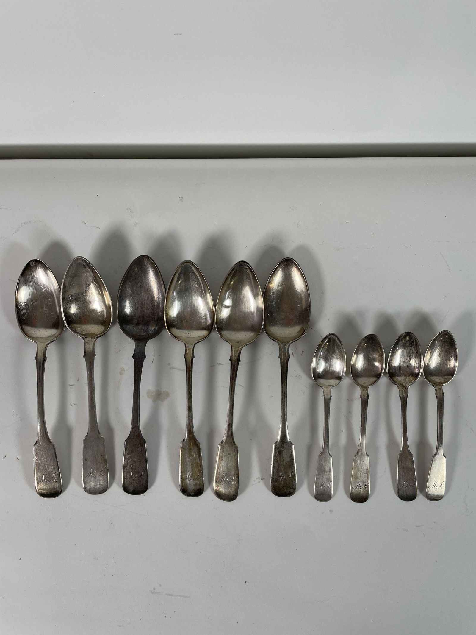 10 PIECES COIN SILVER FLATWARE 1859 "MK". PROPERTY OF A (1 of 6)