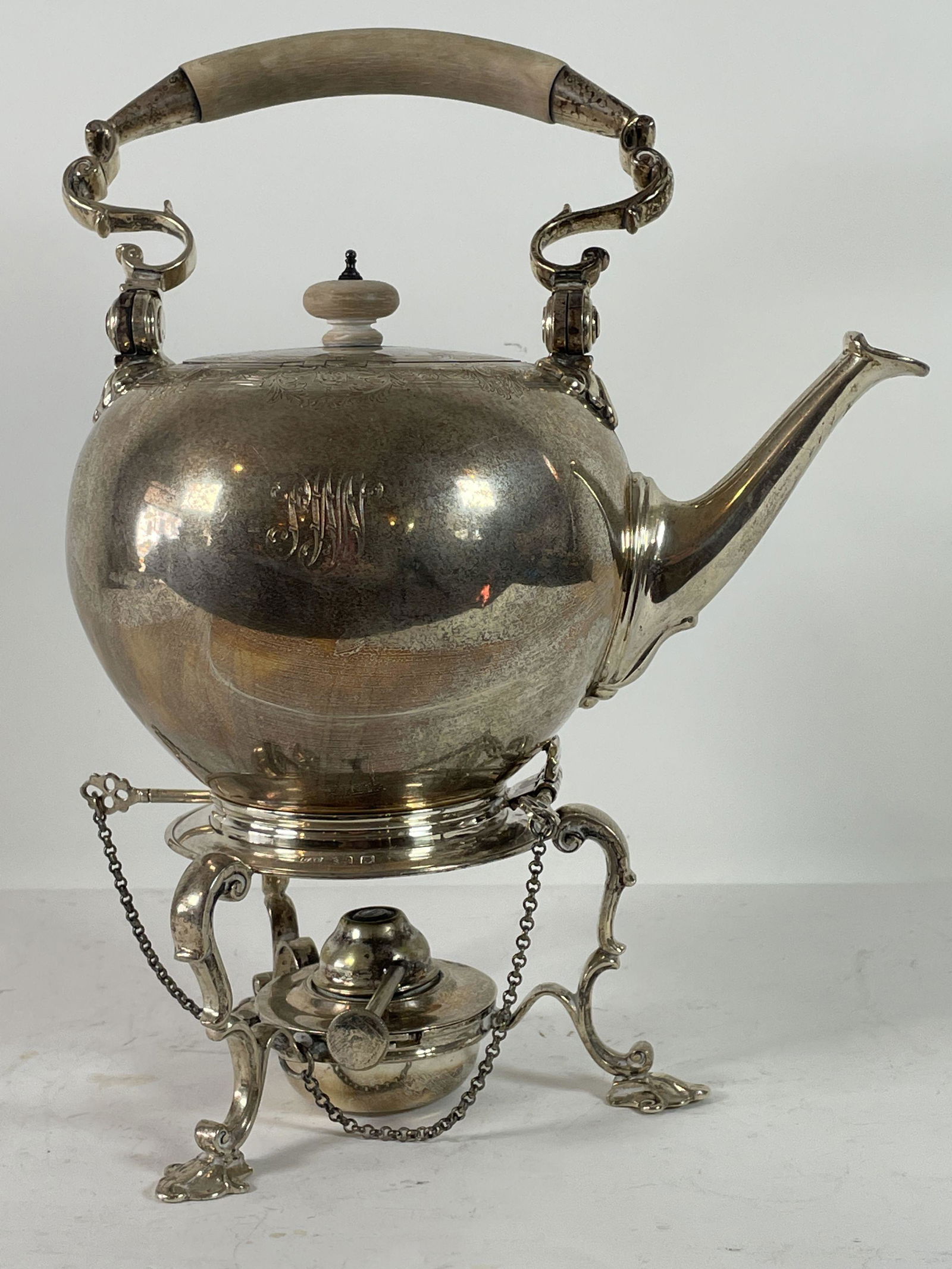 A HALLMARKED STERLING SILVER KETTLE ON STAND WITH CARVE (1 of 8)