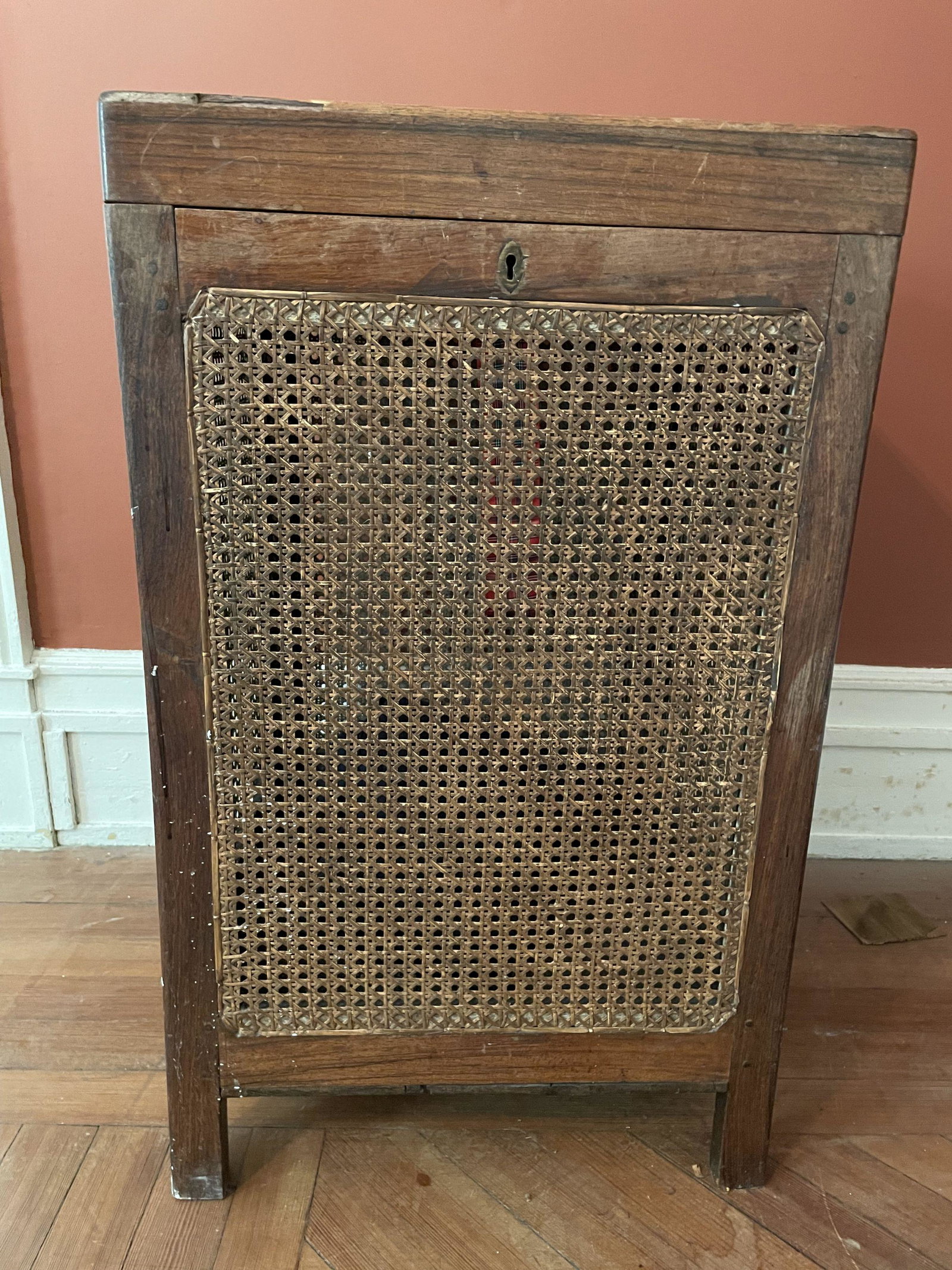 AN ANTIQUE OAK AND CANED CLOTHES HAMPER. 17.5" X 17.5": AN ANTIQUE OAK AND CANED CLOTHES HAMPER. 17.5" X 17.5" X 30". PROPERTY OF A FINE SAG HARBOR ESTATE