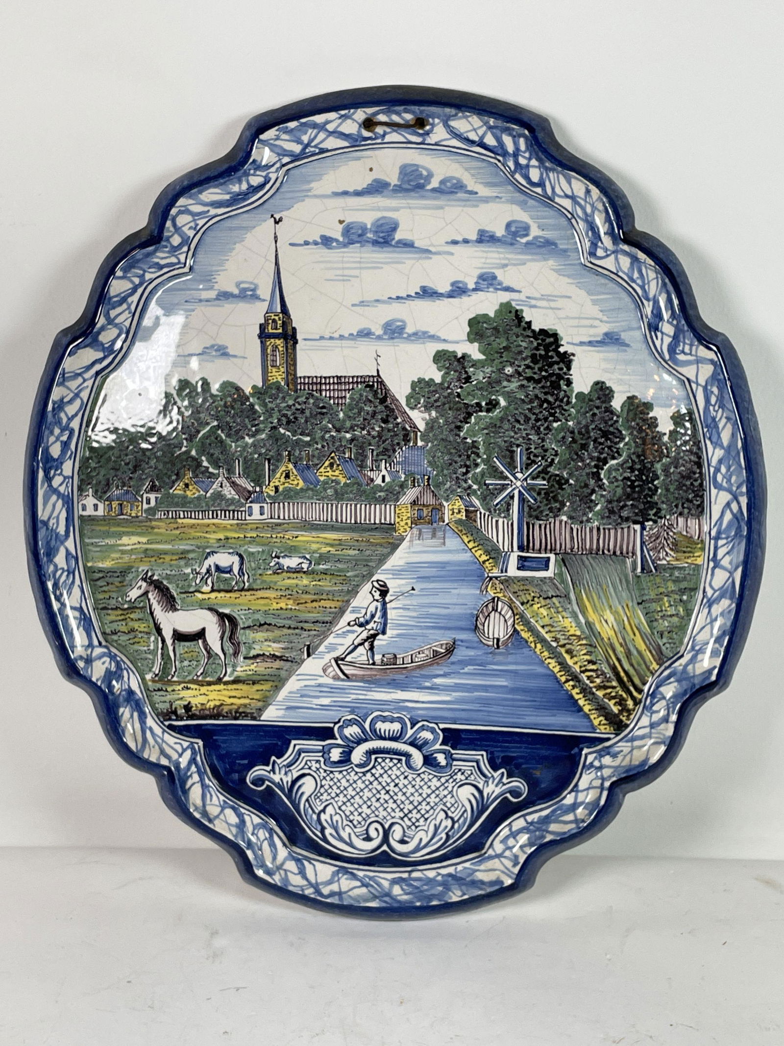 AN EARLY DELFT SCENIC PLAQUE, SOME CHIPPING TO (1 of 5)
