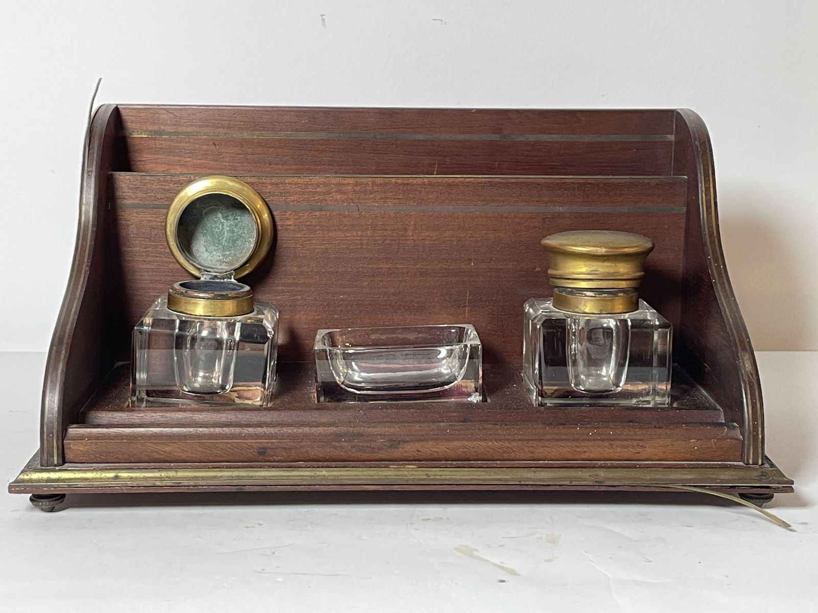 A CONTINENTAL BRASS INLAID MAHOGANY AND GLASS INKWELL (1 of 5)