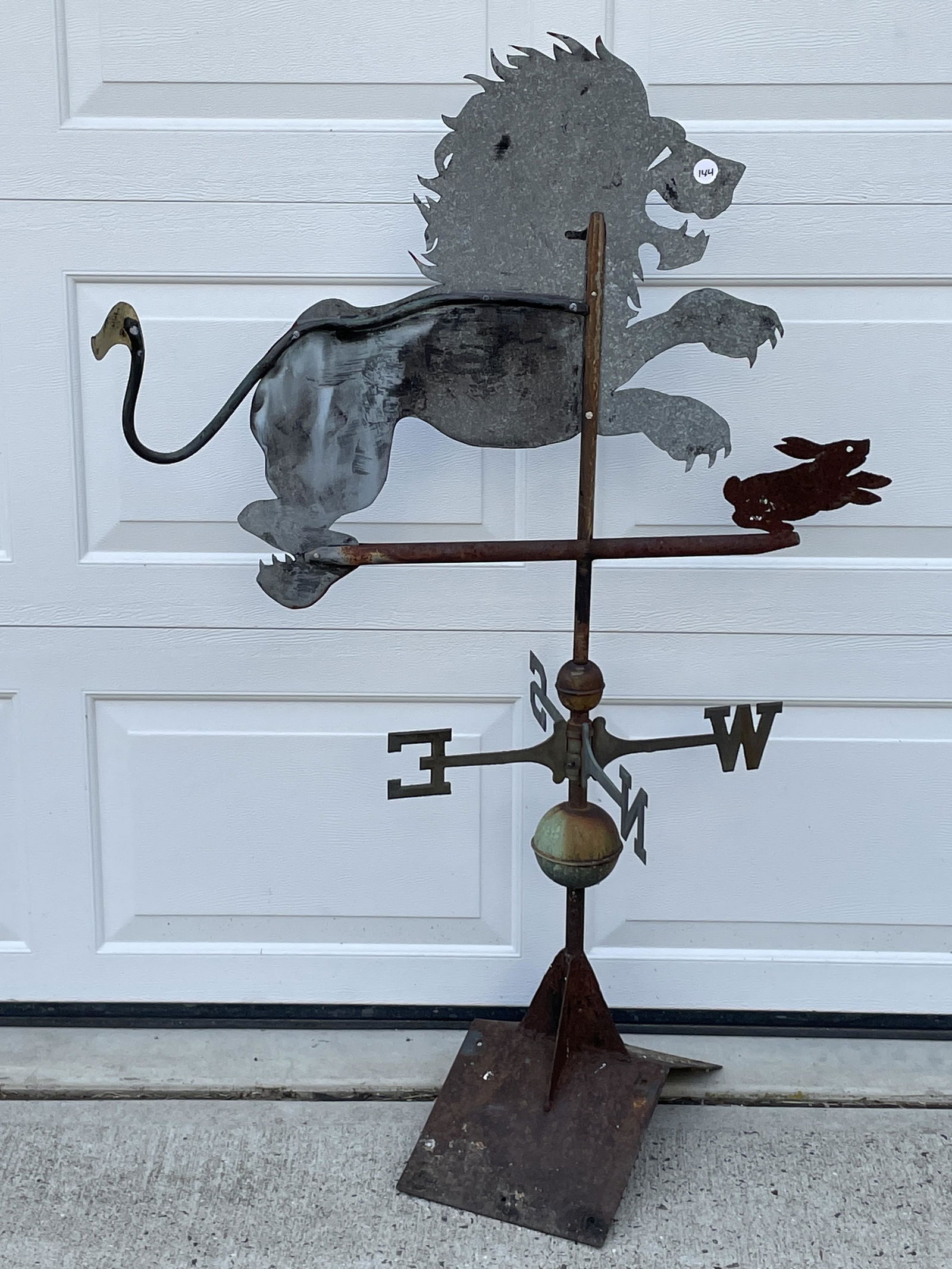 A ZINC SHEET METAL WEATHERVANE OF A LION CHASING A (1 of 3)