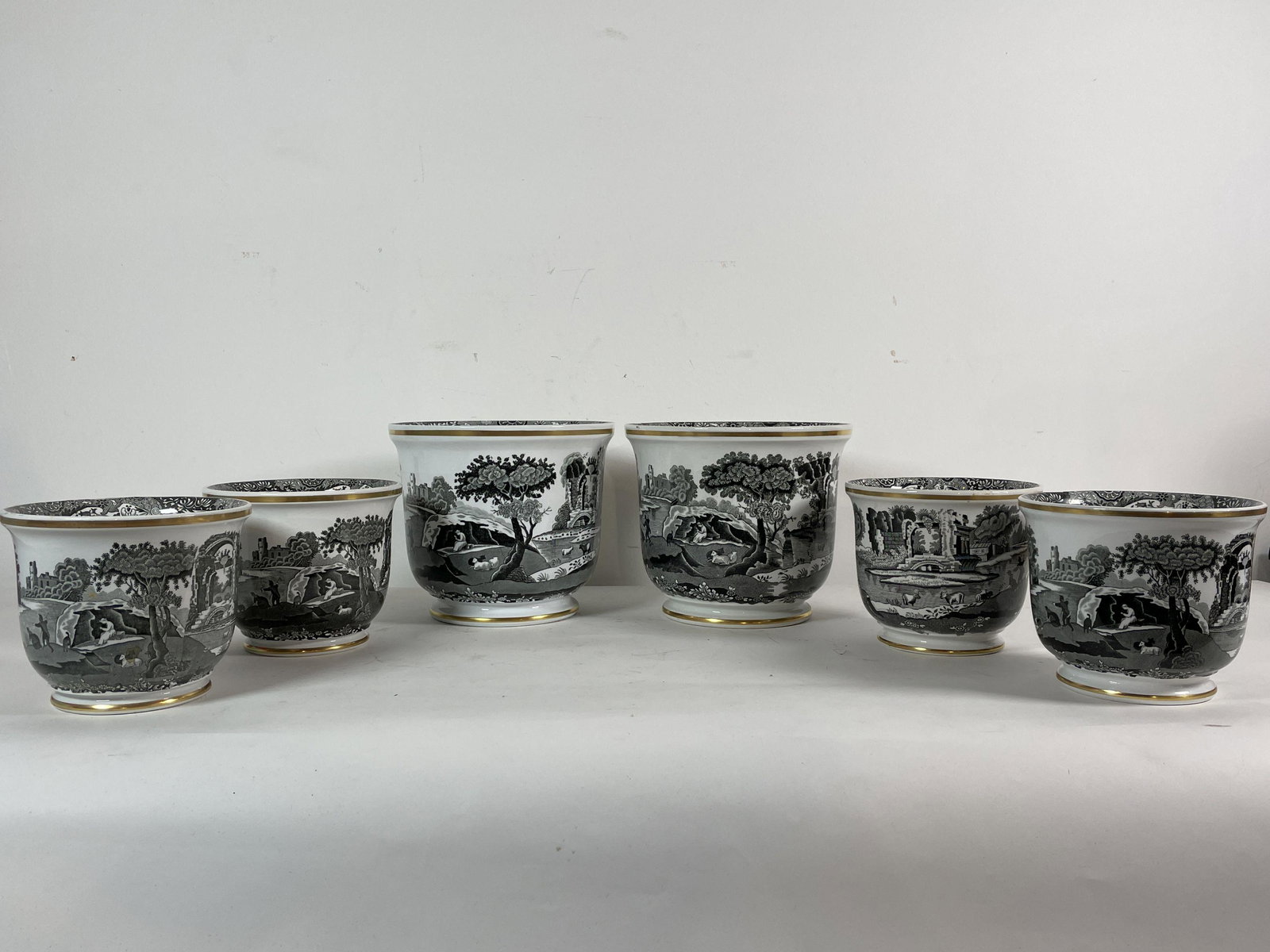 6 PIECES SPODES BLACK ITALIAN PLANTERS, 6.5" AND: 6 PIECES SPODES BLACK ITALIAN PLANTERS, 6.5" AND SMALLER. PROPERTY OF A FINE SAG HARBOR ESTATE