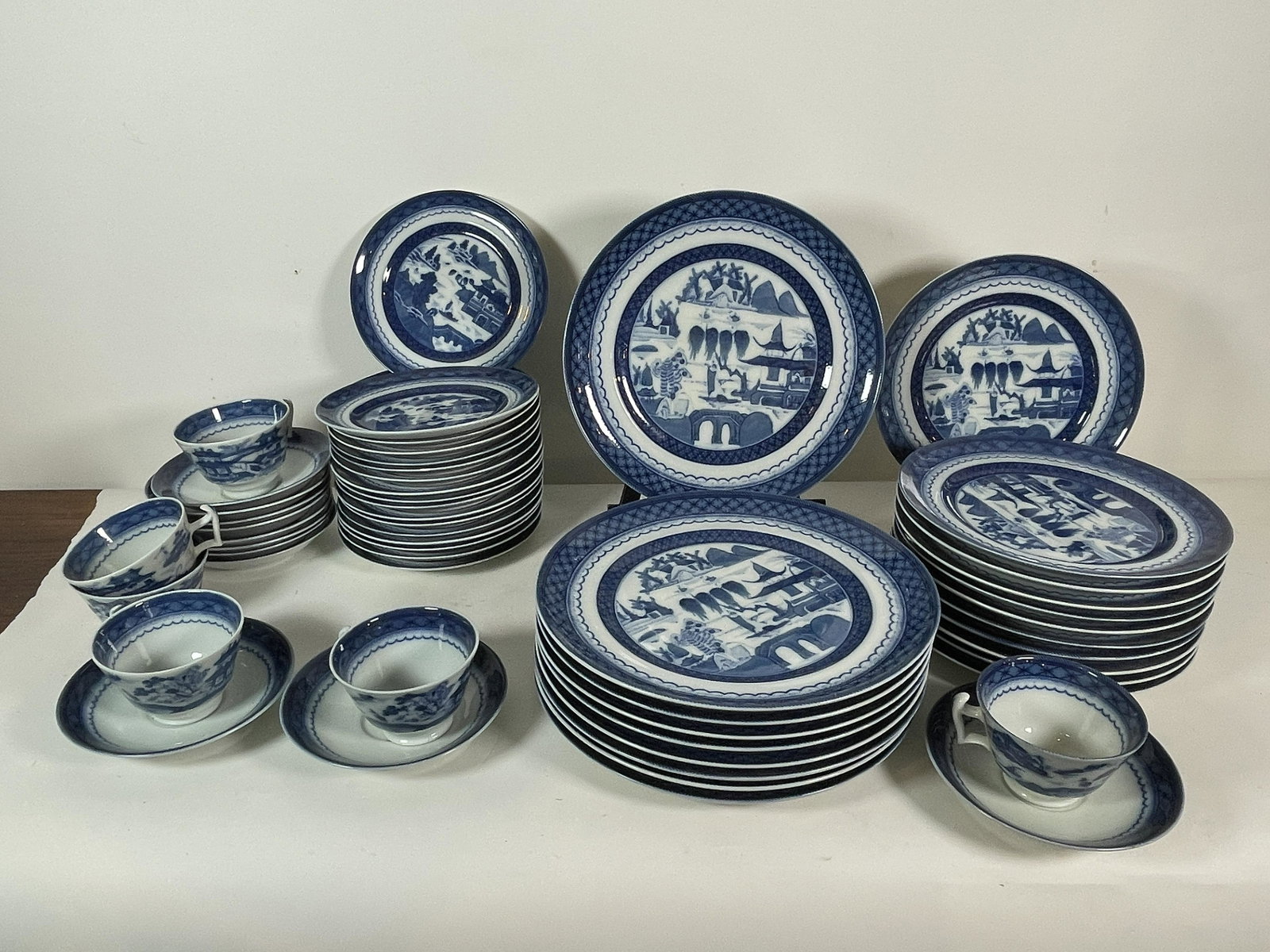57 PIECES MOTTAHEDEH BLUE AND WHITE PORCELAIN. 10" AND: 57 PIECES MOTTAHEDEH BLUE AND WHITE PORCELAIN. 10" AND SMALLER. PROPERTY OF A FINE SAG HARBOR ESTATE