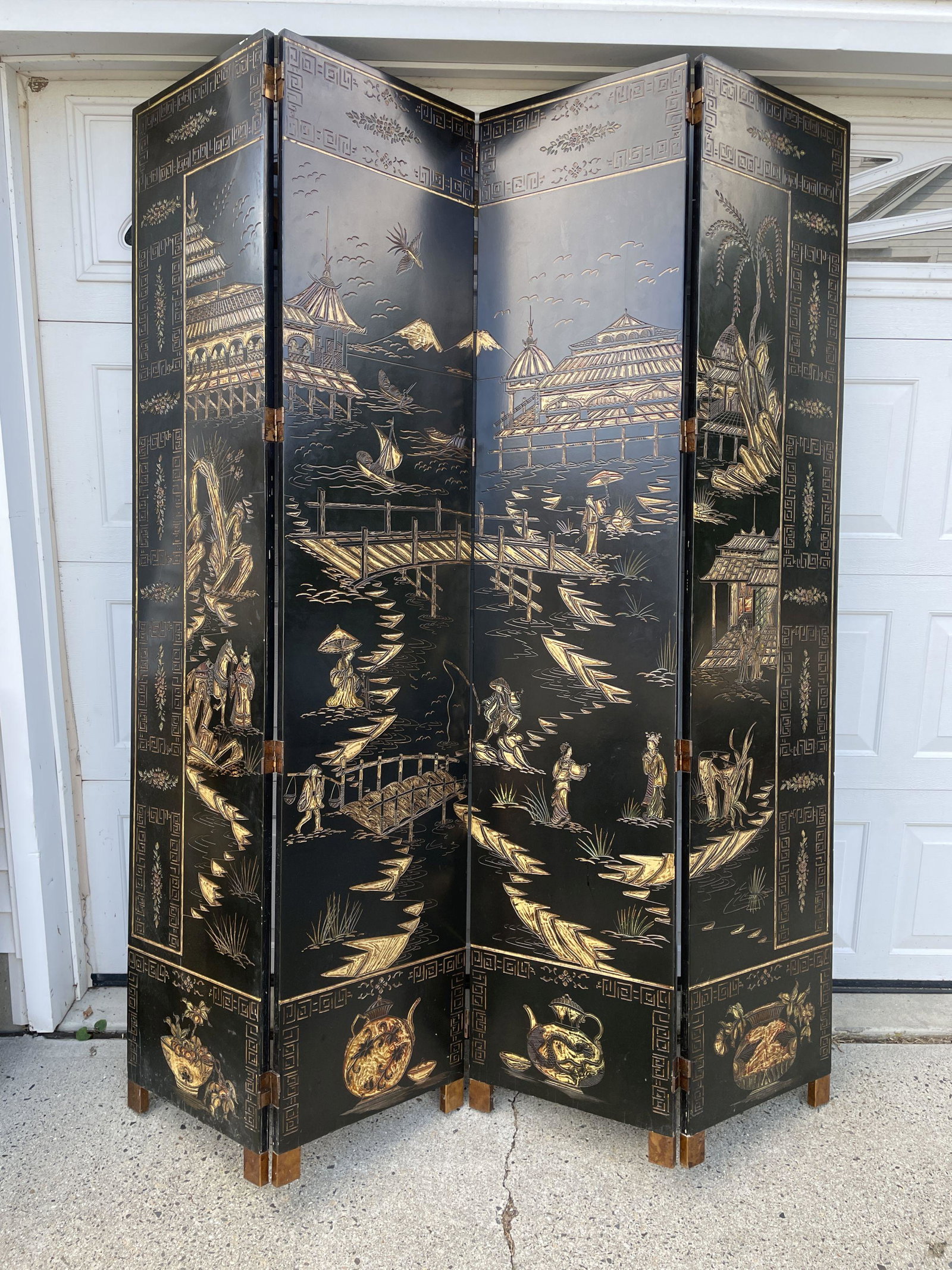 A CARVED AND LAQUERED CHINESE SCREEN. PROPERTY OF A: A CARVED AND LAQUERED CHINESE SCREEN. PROPERTY OF A FINE SAG HARBOR ESTATE