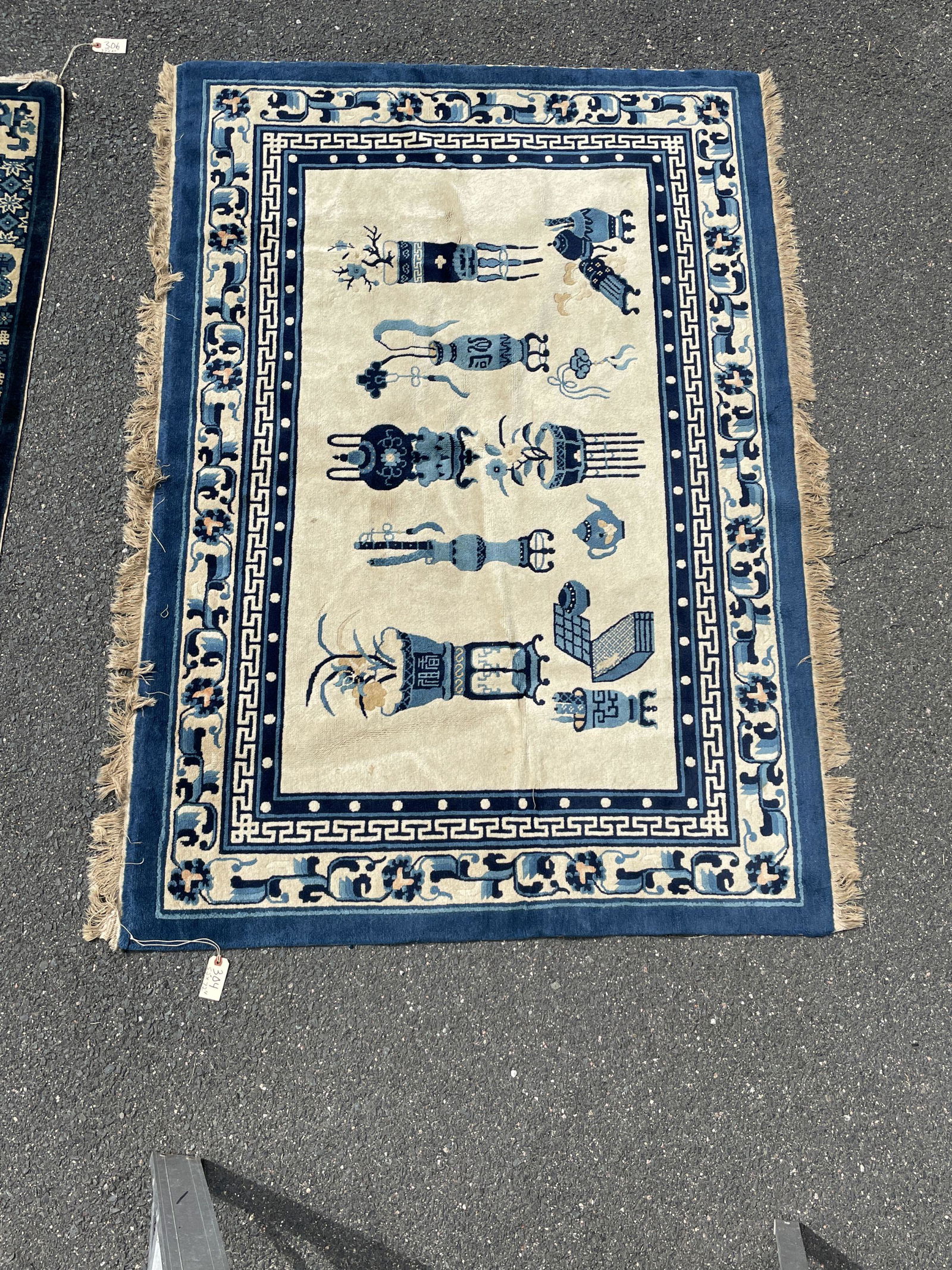 A BLUE AND WHITE CHINESE CARPET, 52" X 72". PROPERTY OF (1 of 4)
