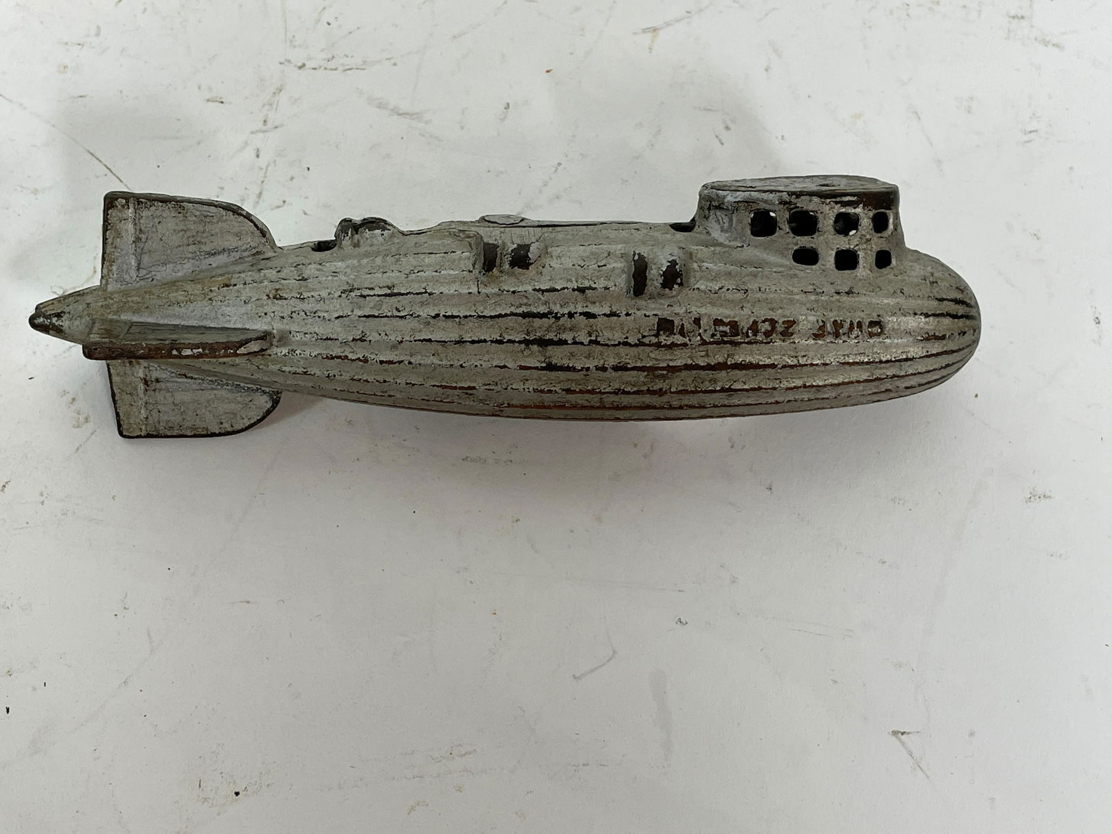 A 7" CAST IRON ZEPPELIN STILL BANK CIRCA 1940. PROPERTY (1 of 3)