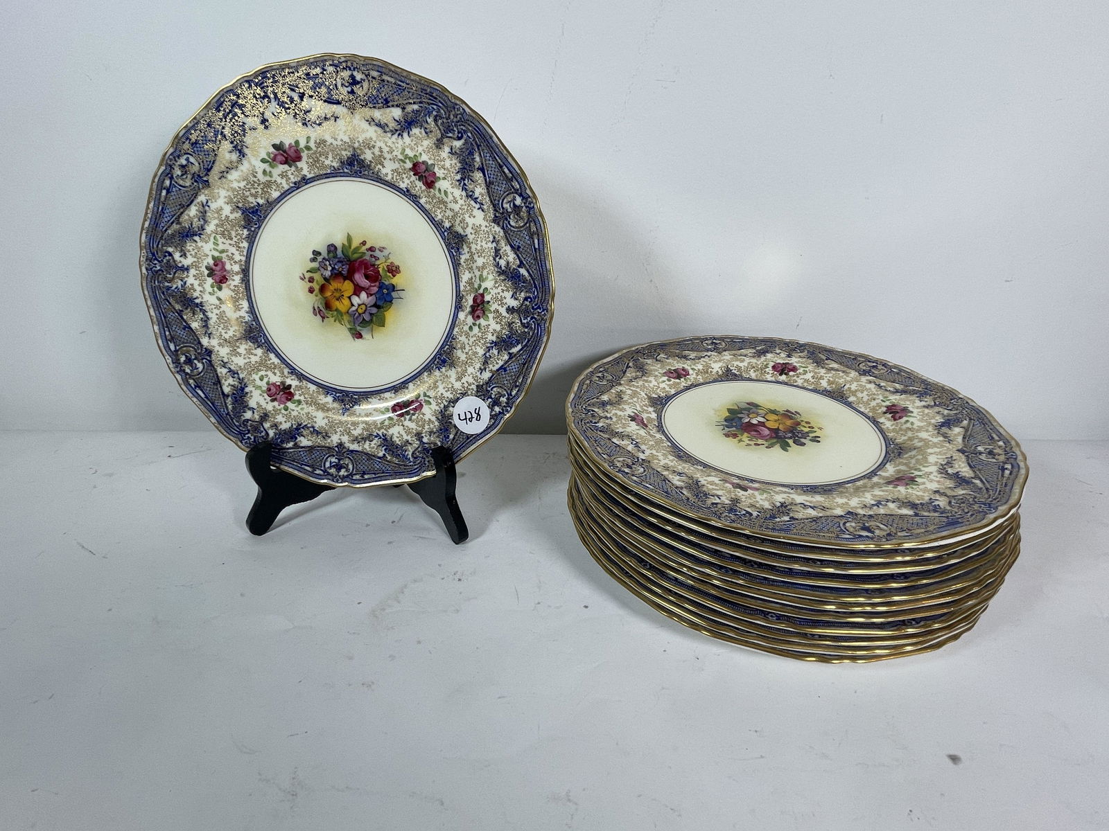 TWELVE GOLD AND COBALT ROYAL WORCESTER DINNER PLATES, (1 of 8)