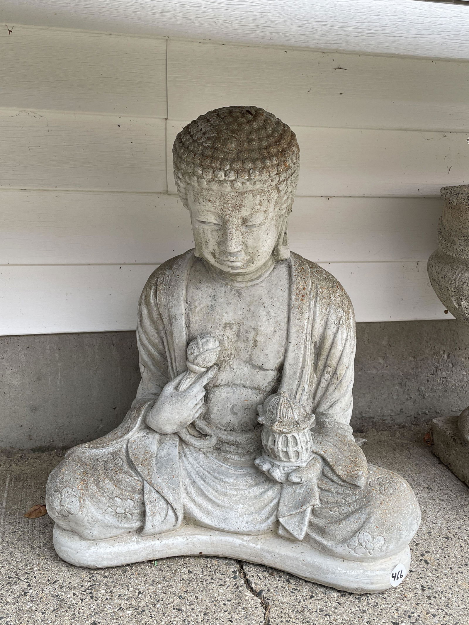 A CAST STONE BUDDHA, 17" X 12" X 21" (1 of 3)