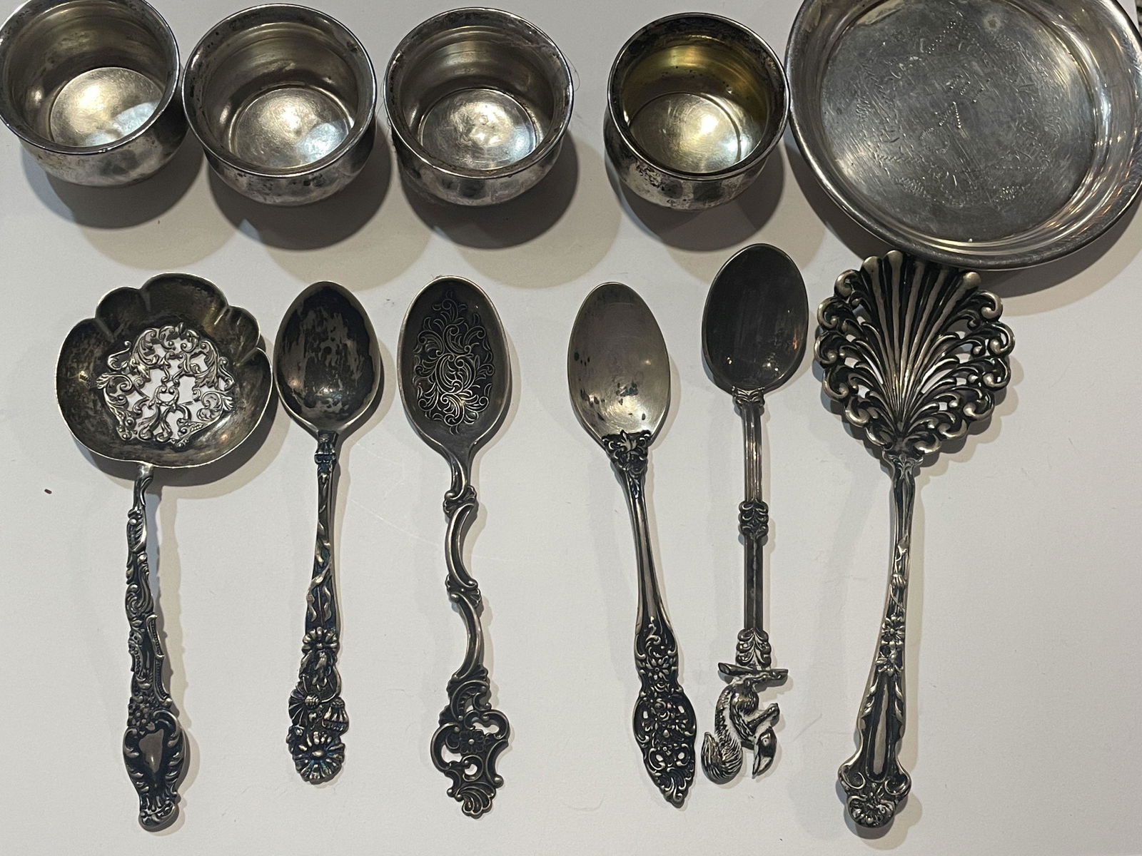 STERLING SILVER SPOONS, SALTS AND COASTER WEIGHS 5.6 TR: STERLING SILVER SPOONS, SALTS AND COASTER WEIGHS 5.6 TROY OUNCES