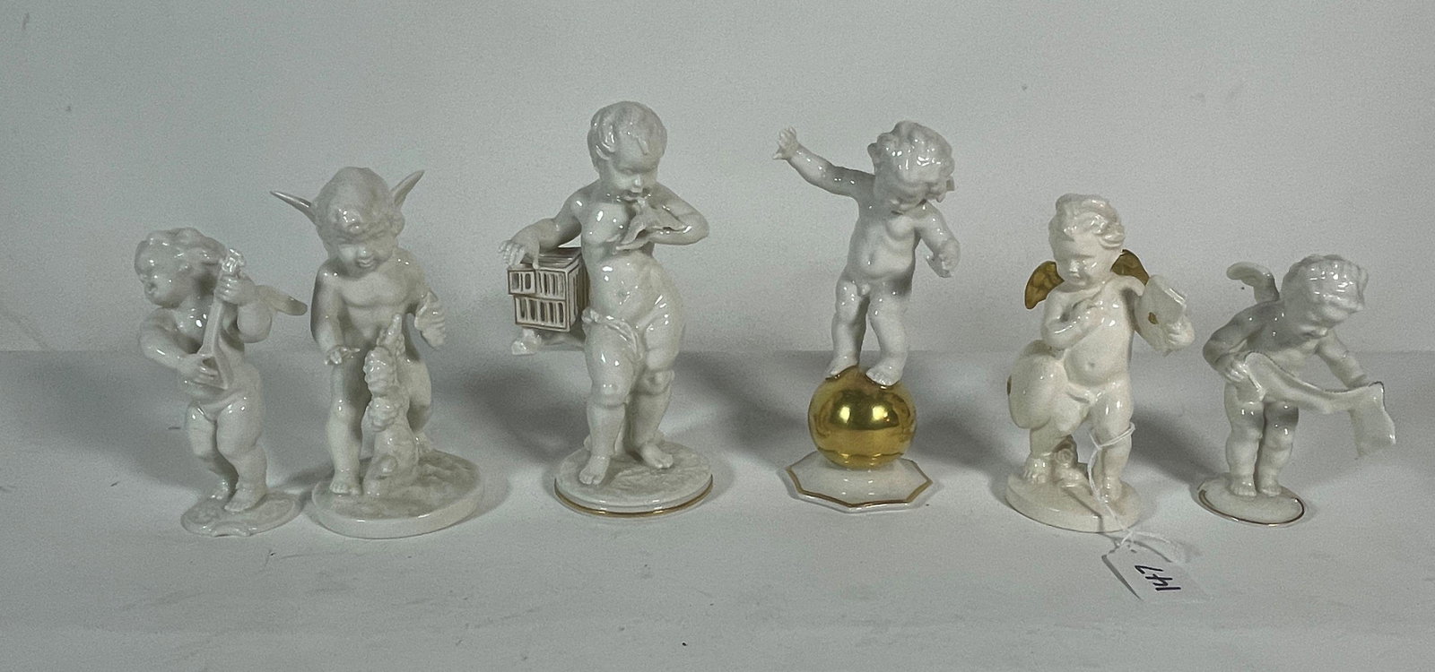 SIX HEUTSCHENREUTHER CHERUB FIGURINES, 7" AND SMALLER: SIX HEUTSCHENREUTHER CHERUB FIGURINES, 7" AND SMALLER