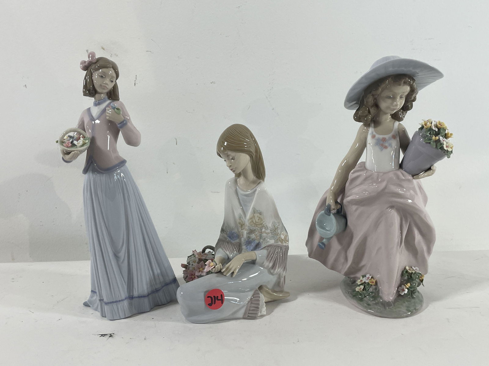 THREE LLADRO FIGURINES OF WOMEN WITH FLOWERS, 10" AND (1 of 5)