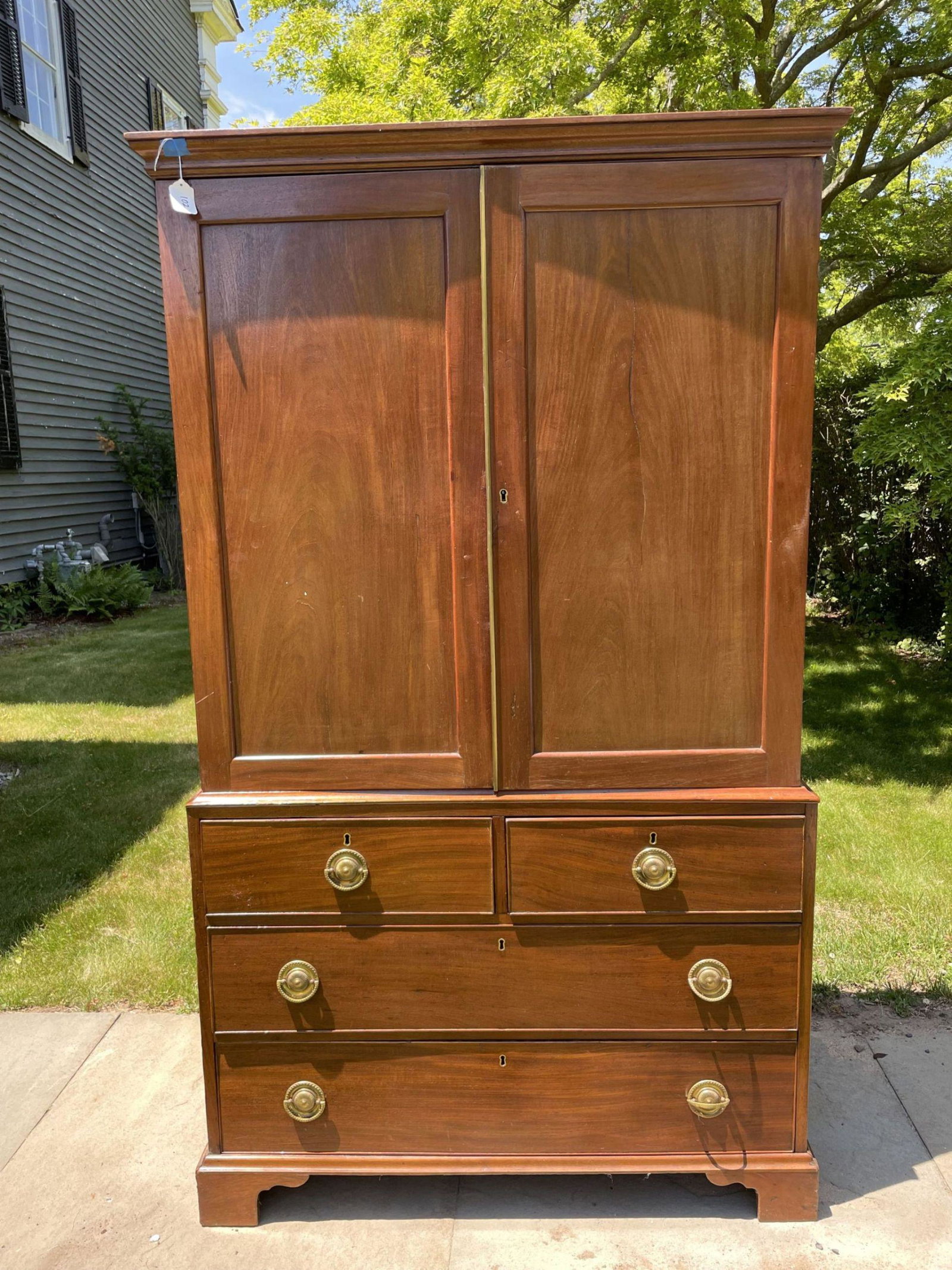 A FINE MAHOGANY LINEN PRESS, 42" X 22" X 73". PROPERTY: A FINE MAHOGANY LINEN PRESS, 42" X 22" X 73". PROPERTY OF A FINE SAG HARBOR ESTATE