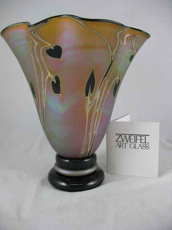 ZWEIFEL GLASS 8" FAVRILLE VASE: ZWEIFEL GLASS 8" FAVRILLE VASE Craig Zweifel was born in 1944 in San Diego, and raised in Oakland, California. He began working with glass under Dr. Robert Fritz at San Jose State University in 1966,