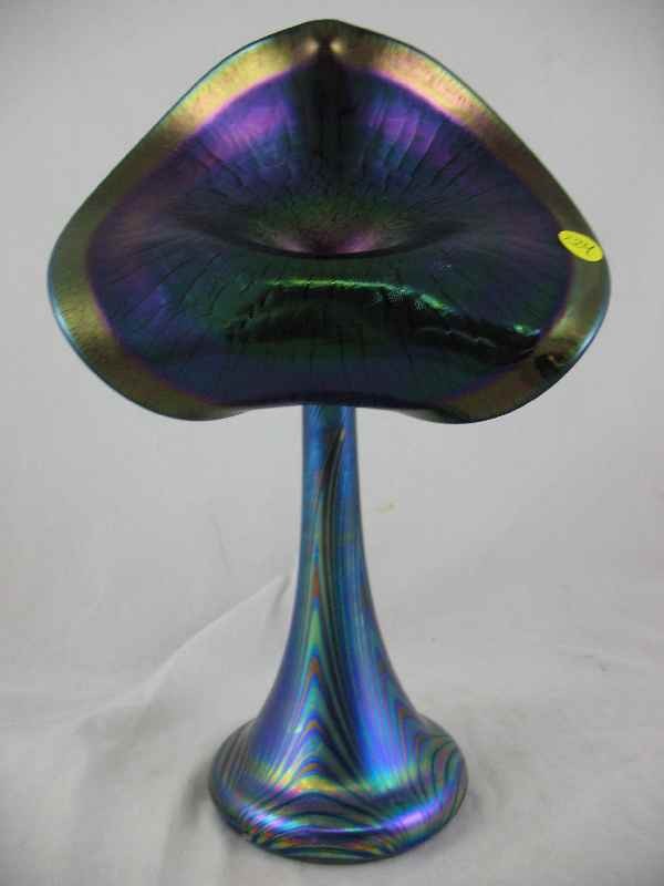 ABELMAN ART BLUE GLASS VASE 13"T: ABELMAN ART BLUE GLASS VASE 13"T Stuart Abelman attended Carnegie-Mellon University receiving his BFA in painting and sculpture. He received his Masters of Fine Arts in Glass at UCLA. As one of the pi
