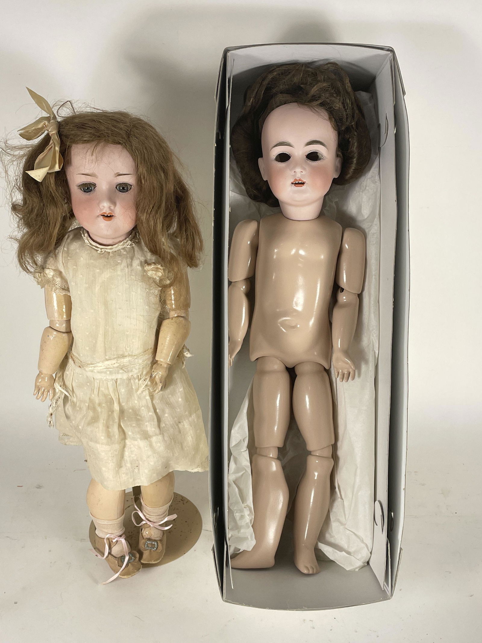 TWO ANTIQUE DOLLS, ONE ARMAND MARSEILLE PORCELAIN HEAD WITH ORIGINAL BODY, THE OTHER GERMAN (1 of 7)