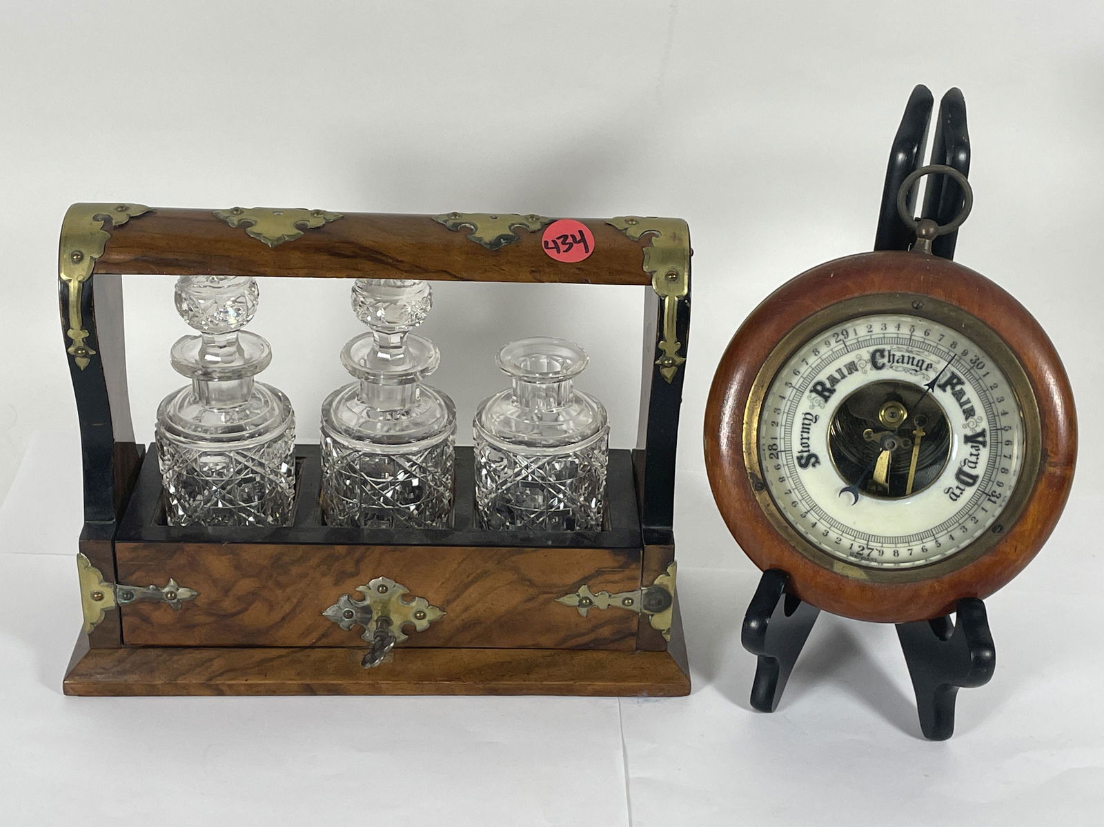 19TH CENTURY LOCKING TANTALAUS W/ GLASS CRYSTAL BOTTLES AND A SHIPS BAROMETER, 9" X 8" X 3" AND 7" X (1 of 6)