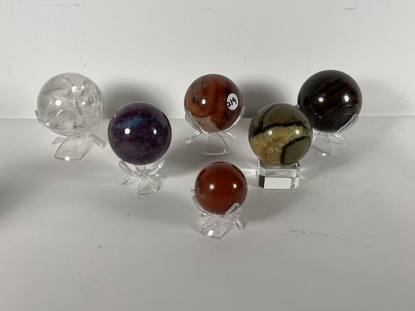 A LOT OF SIX POLISHED STONE ORBS, 3" DIAMETER AND SMALLER: A LOT OF SIX POLISHED STONE ORBS, 3" DIAMETER AND SMALLER