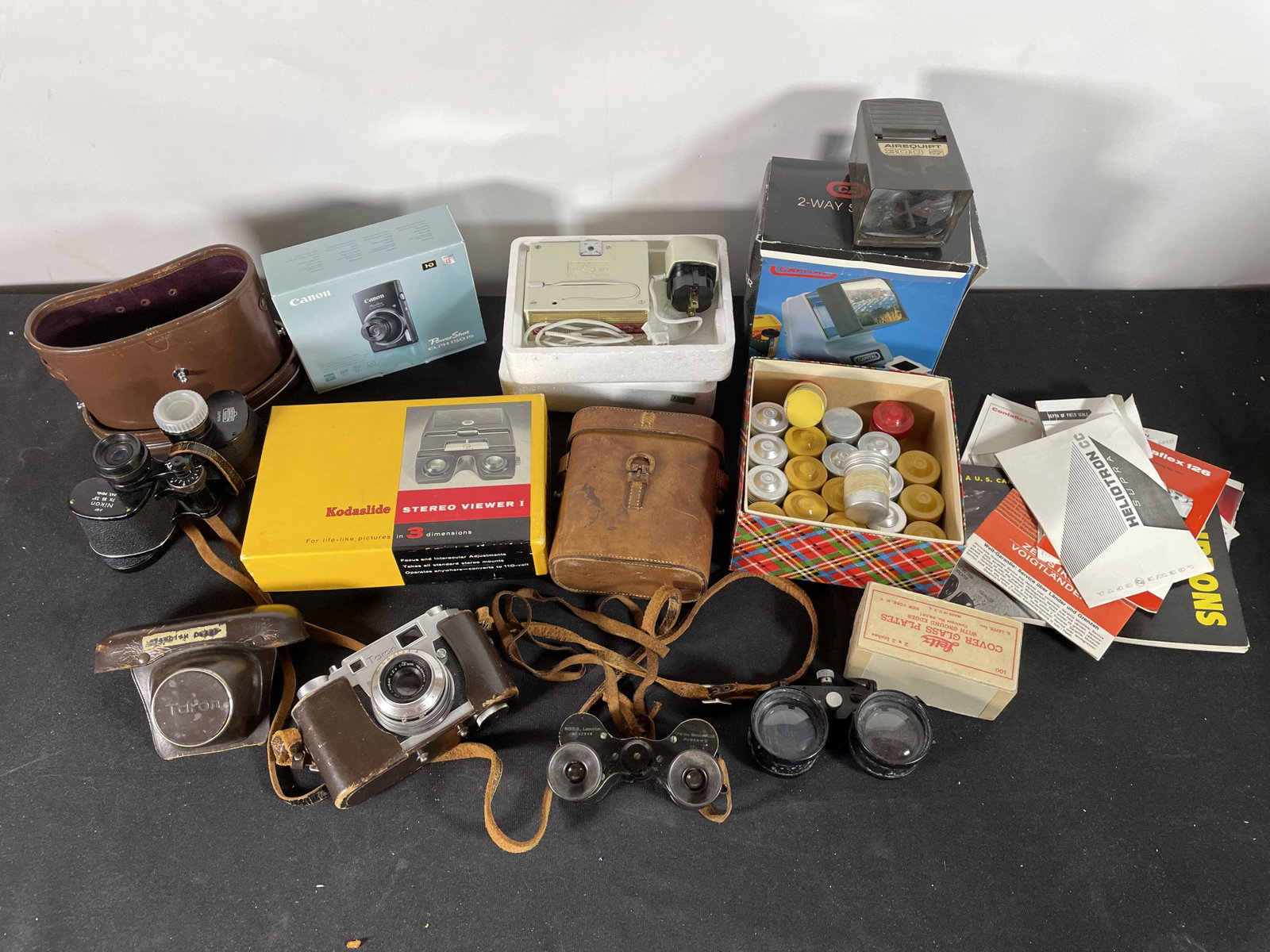 LOT OF BINOCULARS AND CAMERA EQUIPMENT INCLUDES ROSS AND NIKON BINOCULARS, A STEREOVIEWER AND MORE: LOT OF BINOCULARS AND CAMERA EQUIPMENT INCLUDES ROSS AND NIKON BINOCULARS, A STEREOVIEWER AND MORE