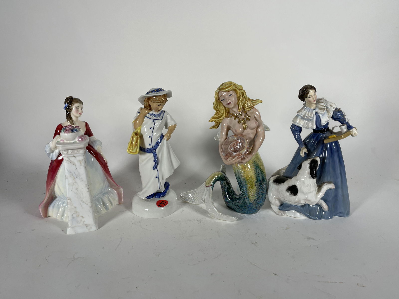 FOUR ROYAL DOULTON FIGURINES, 8.5" AND SMALLER (1 of 7)