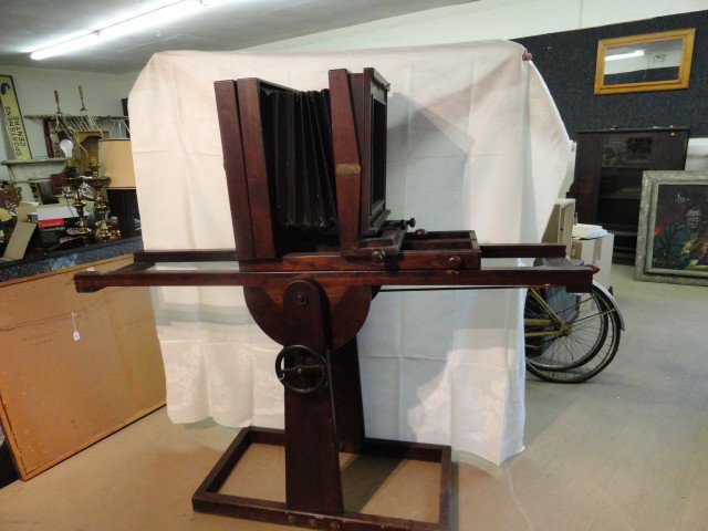 #8A CENTURY STUDIO CAMERA ON MAHOGANY STAND: #8A CENTURY STUDIO CAMERA ON MAHOGANY STAND, BRASS-BOUND BAUSCH & LOMB LENS (64" T INC. STAND, PLATE SIZE 13" X 14")