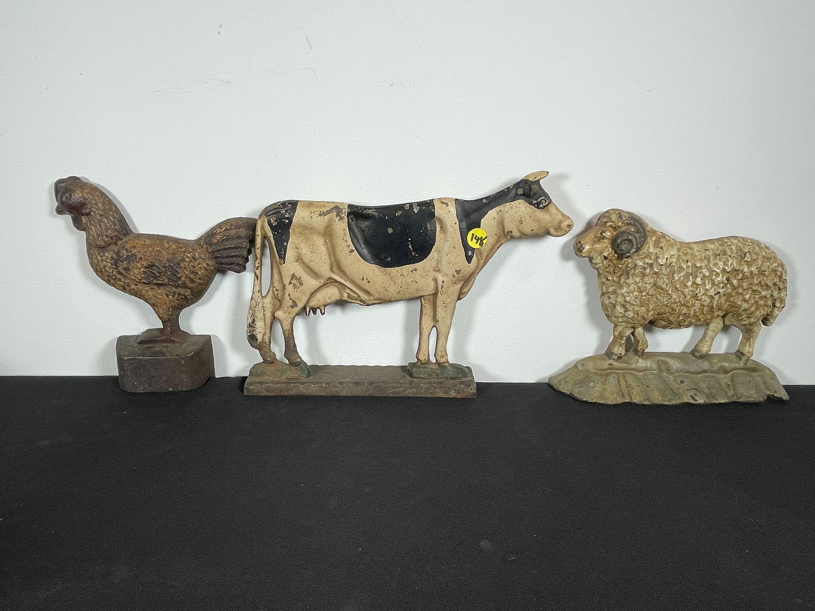 THREE CAST IRON ANIMAL DOORSTOPS, A COW, CHICKEN, AND RAM. 13" X 9" AND SMALLER (1 of 7)