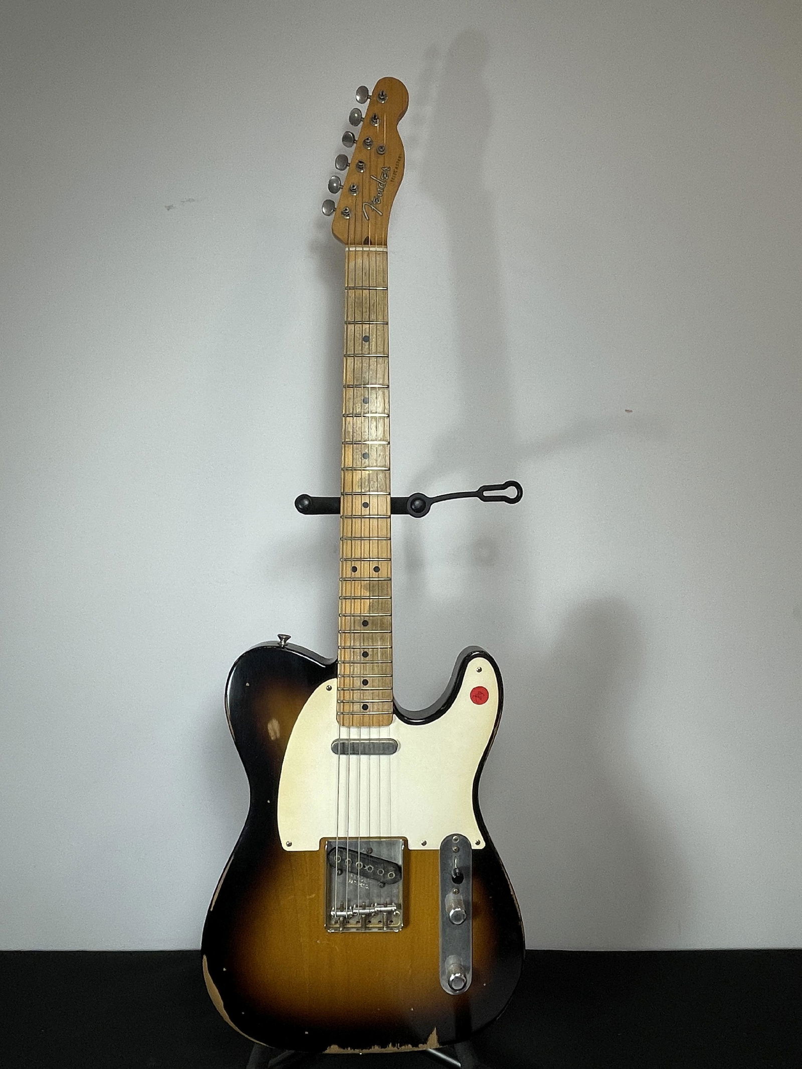 A FENDER TELECASTER ELECTRIC GUITAR IN SOFT CASE SN: MZ8054941. HEAVY WEAR TO BODY FROM USE: A FENDER TELECASTER ELECTRIC GUITAR IN SOFT CASE SN: MZ8054941. HEAVY WEAR TO BODY FROM USE
